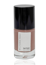 A bottle of Weathered Penny nail polish in a dusty mauve-pink shade, featuring a white label and a glossy black cap, set against a plain white background with a soft reflection below.