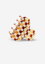 Checkered hair clip on a white background