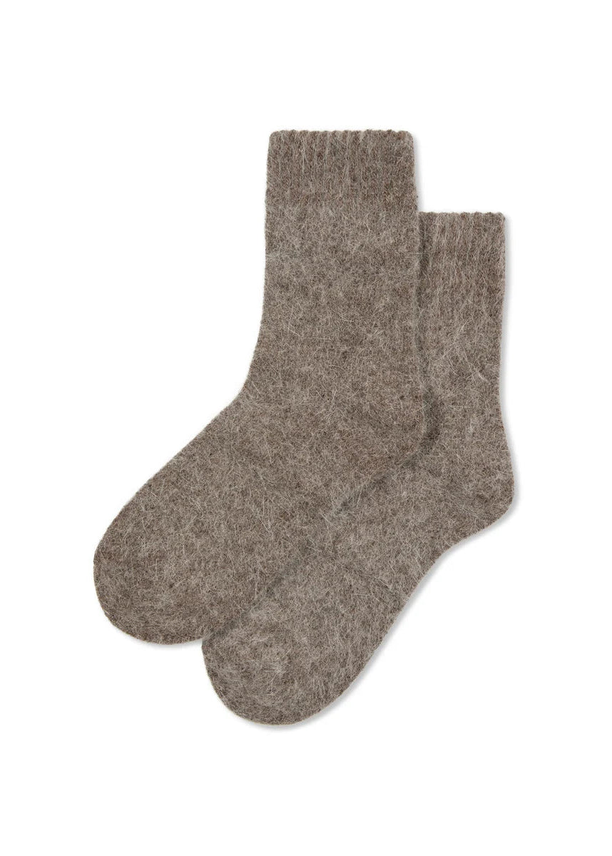 A pair of textured, heathered taupe-brown wool socks displayed flat against a solid white background.