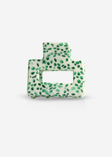 Decorative item with green leaf pattern on a white background