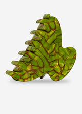 Green dragon-shaped object on a white background