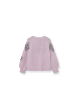 A light pink knit sweater with geometric diamond patterns in black and white on the upper sleeves, shown from the back on a white background.