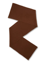 A single brown fabric accessory, likely a scarf or long tie, arranged in a zigzag pattern on a plain white background.