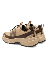 Beige and brown sneakers on a white background
