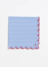 A square light blue and white striped fabric napkin with a decorative pink and red scalloped border, displayed flat against a clean white background.