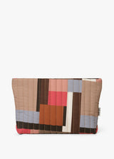 A quilted cosmetic pouch with a geometric patchwork pattern in beige, brown, pink, orange, light blue, and white, shown against a plain white background.