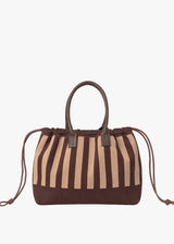 A brown and beige vertically striped drawstring tote bag with dark brown leather handles, shown against a plain white background.