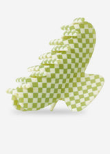 Green and white checkered shoe-shaped object on a light gray background